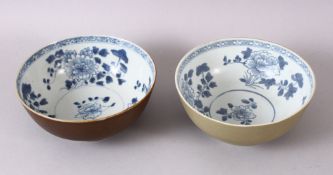 A PAIR OF CHINESE NANING CARGO BLUE & WHITE BOWLS, with a cafe au lait exterior glaze and floral