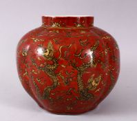 A CHINESE RED & YELLOW DRAGON PORCELAIN JAR, the moulded panels with yellow dragons upon red ground,