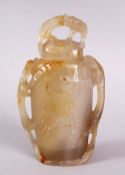 A CHINESE CARVED AGATE LIDDED CENSER / VASE, with relief carved detailing of chilong to the sides