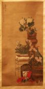 A CHINESE SCROLL PAINTING OF FLOWERS, painted with a display of native floral arrangement, with