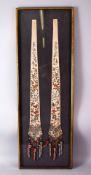 A PAIR OF 19TH CHINESE FRAMED EMBROIDERED SILK HANGINGS, embroidered with scenes of figures,