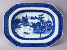 AN 18TH CENTURY CHINESE BLUE & WHITE PORCELAIN SERVING DISH, decorated with landscape waterside