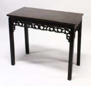 A LATE 19TH / EARLY 20TH CENTURY CHINESE HARDWOOD RECTANGULAR TABLE, with entwined carved and