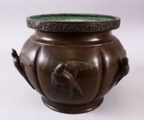 A JAPANESE MEIJI PERIOD BRONZE RELIEF JARDINIERE, with relief bird figures to each panel, and a