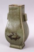 A CHINESE SONG STYLE CRACKLE GLAZED POTTERY VASE, with rows of calligraphy to the body, twin moulded