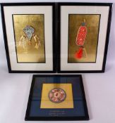 A 19TH CENTURY CHINESE FRAMED EMBROIDERED CHING DYNASTY TEA CUP MAT, framed 36cm x 36cm, together