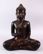 A FINE EARLY CARVED WOOD & LACQUER THAI BUDDHA, in a seated vitarka mudra pose, with traces of red