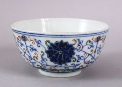 A CHINESE GUANGXU STYLE DOUCAI DECORATED PORCELAIN RICE BOWL, decorated with scrolling lotus