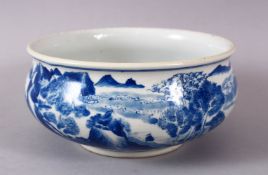 A CHINESE BLUE & WHITE PORCELAIN BRUSH POT, with figures in a waterside landscape, 15.5cm