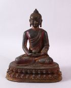 A TIBETAN / CHINESE BRONZE FIGURE OF BUDDHA, in a seated meditating position holding a burner,