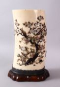 A JAPANESE MEIJI PERIOD CARVED IVORY & SHIBAYAMA TUSK VASE SECTION, inlaid with semi precious stones