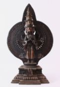 A LARGE CHINESE BRONZE FIGURE OF A MULTI HEAD & ARM DEITY / BUDDHA, stood upon a pedestal / lotus