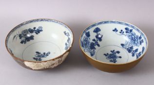 A PAIR OF CHINESE NANING CARGO BLUE & WHITE BOWLS, with a cafe au lait exterior glaze and floral
