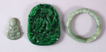 THREE CHINESE JADE / JADEITE ITEMS, one large pendant, one smaller and one bangle. (3)