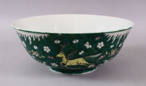 A 19TH / 20TH CENTURY CHINESE FAMILEL VERTE PORCELAIN BOWL, Decorated with horses uopn a wave ground