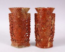 A PAIR OF 19TH CENTURY CHINESE CARVED SOAPSTONE POSEY VASES, Each carved with dragins and