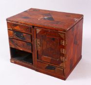 AN ORIENTAL INLAID MINIATURE PEDESTAL DESK, with multi wood inlays, in three pieces, with a door