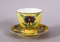 A CHINESE YELLOW GROUND KANGXI STYLE PORCELAIN TEA CUP & SAUCER, the yellow ground decorated with