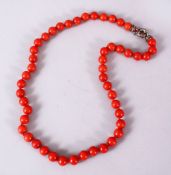 A 19TH / 20TH CENTURY CHINESE CARVED CORAL NECKLACE, Comprising 49 carved beads, approx 60gms,