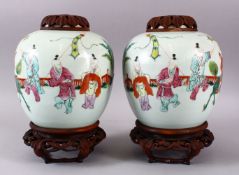 A PAIR OF 19TH / 20TH CENTURY CHINESE FAMILLE ROSE PORCELAIN GINGER JARS, each jar decorated with