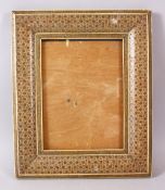 AN ANGLO INDIAN MICRO MOSAIC INLAID PHOTO FRAME, 34.5cm x 28.5cm