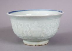 A CHINESE MING XUANDE STYLE CARVED CELADON PORCELAIN RICE BOWL, Carved with object decoration,