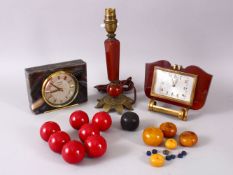 A SMALL GROUP OF ITEMS some possibly containing cherry amber.