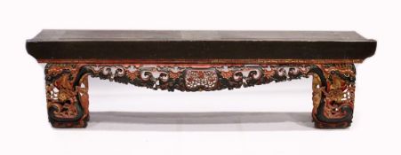 A LONG 17TH / 18TH CENTURY CHINESE ALTAR TABLE, the base carved and pierced with flowers and