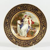 A GOOD VIENNA CIRCULAR PLATE,blue and gilt border, the centre painted with a classical scene, youn