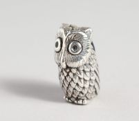 A SILVER OWL PIN CUSHION