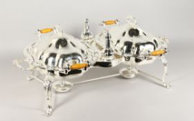 A SUPER PLATE DOUBLE VEGETABLE TUREEN STAND and pair of peppers on a stand with two burners