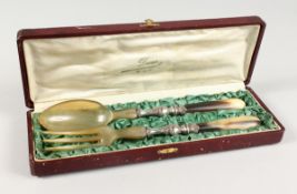 A DOUER ST DIE CASED HORN SALAD SERVERS. Fork and Spoon. Fork 28cm