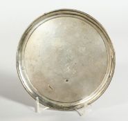 A GEORGE III SILVER CIRCULAR WAITER, 7 inches diameter, with bead edge. Armorial crest on three