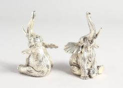 A PAIR OF 800 ELEPHANT SALT AND PEPPERS