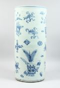 A CHINESE BLUE AND WHITE STICK STAND 22 ins high.