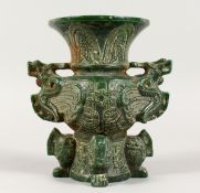 A CHINESE CARVED GREEN STONE ARCHAIC DRAGON VASE 7 ins, high