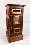 A GOOD SQUARE SHAPED MAHOGANY DESK LETTERBOX with single door and brass plaque. 19 ins high.