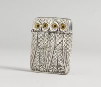 A SILVER PLATED OWL VESTA
