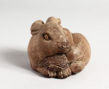 A CHINESE CARVED WOOD RABBIT 2.5 ins