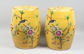 A PAIR OF CHINESE YELLOW BARREL SEATS with birch and flowers 17 ins high