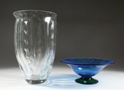 A PLAIN GLASS VASE 13 ins. high and A BLUE GLASS DISH 11 ins. diameter.