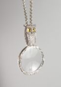 AN OWL MAGNIFYING GLASS on a chain