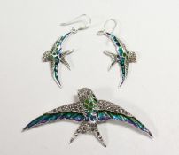 A SILVER AND MARCASITE SWALLOW BROOCH AND PAIR OF EARRINGS.