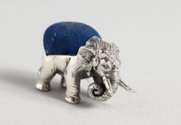 A SILVER ELEPHANT PIN CUSHION