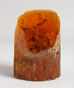 A PIECE OF AMBER 4 ins high