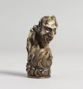 A BRASS DEVIL VESTA