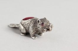 A SILVER BEAVER PIN CUSHION
