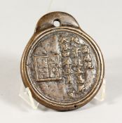 A LARGE CHINESE CIRCULAR BRONZE MEDALLION 3.75 ins diameter,