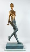 AN ABSRACT STANADING BRONZE NUDE on a rectangular base. 16 ins high.