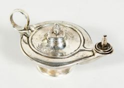 A SMALL VICTORIAN SILVER OIL LAMP, 4.24 inches long, inscribed Col. T. Phillips 1877, Peninsula XVII